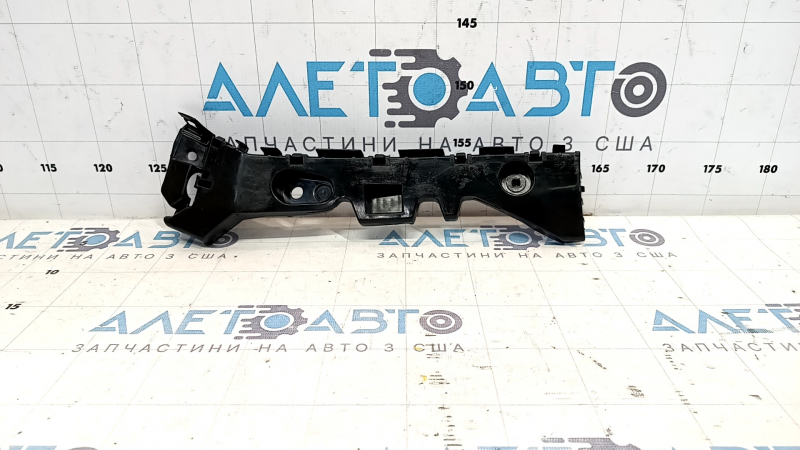 Крепление заднего бампера левое Mazda 3 14-18 BM 5d