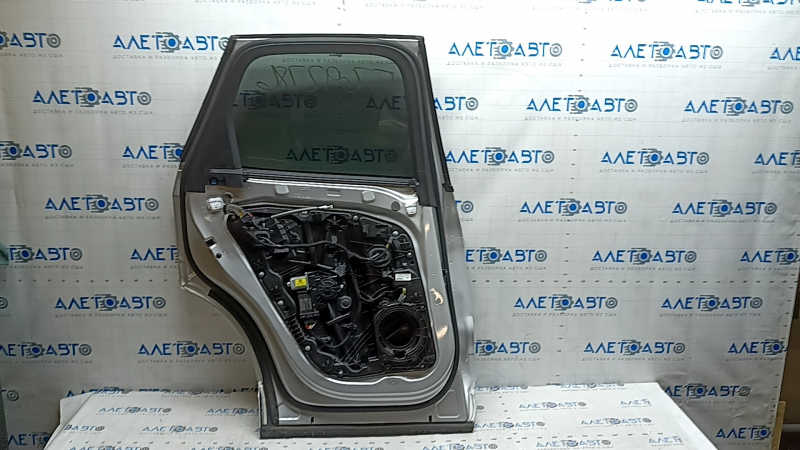 Двері в зборі задні ліві Volvo XC60 18-26 Keyless, срібло 711, тонування, хром молдинг, пісок, подряпини, подряпини на молдингу, подряпини на накладках