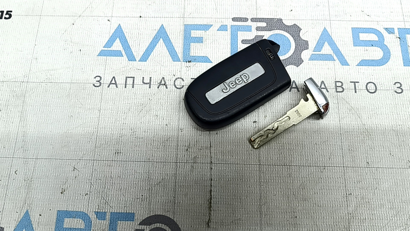 Ключ Jeep Compass 17-26 smart, 4 кнопки, царапины, стерлись кнопки