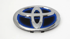 Емблема решітки радиатора Toyota Camry v50 12-14 hybrid usa